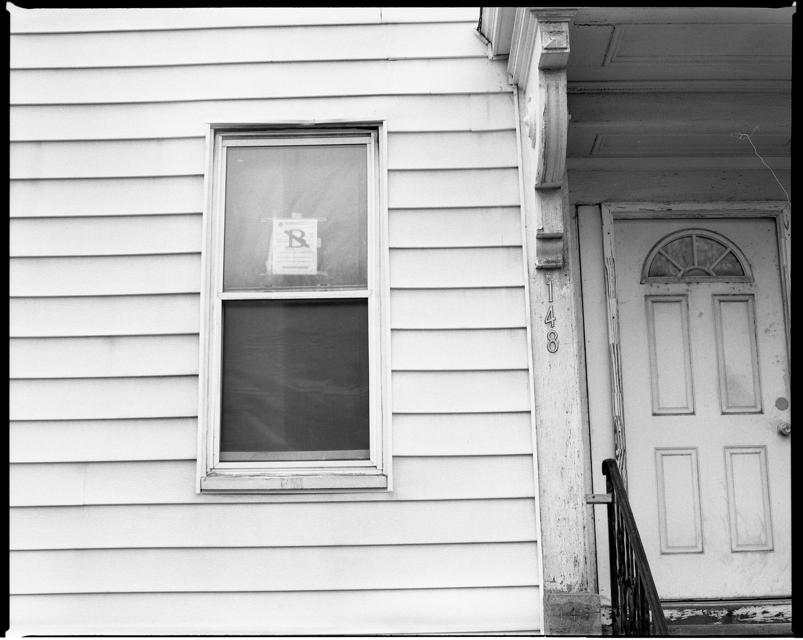 white wooden window frame on white wooden wall